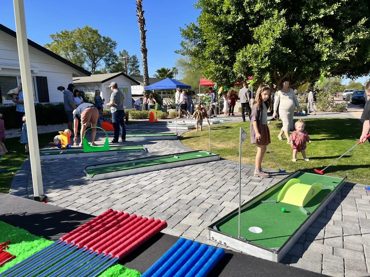Mini golf at an outdoor gathering