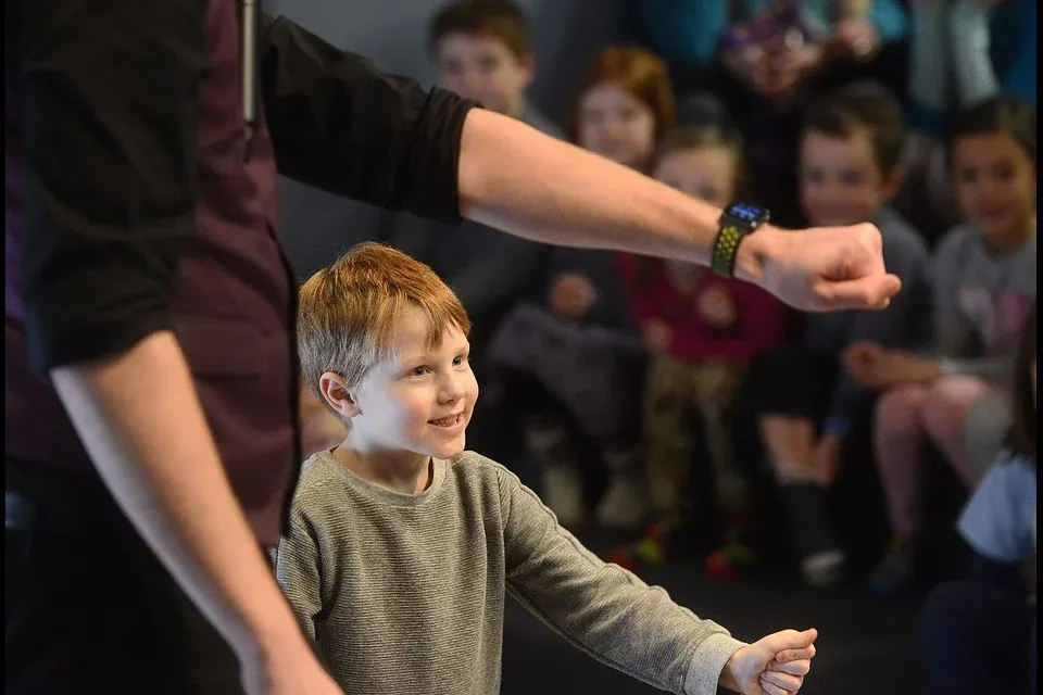 A Presswood magic show at a holiday event